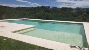 Casa con pileta en barrio privado